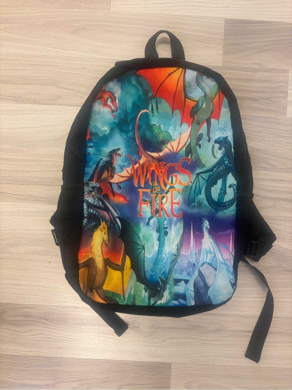 Wings of Fire Kids' Backpack — Vibrant Multicolor Dragon Print